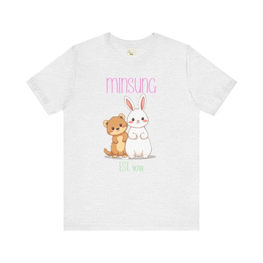 White t-shirt with cartoon dog and rabbit design and 'Minsung' text on a white background